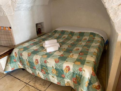 Letto o letti in una camera di Trullo Suite Regina