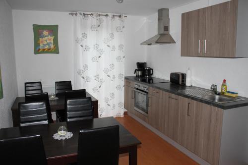 Kuchyň nebo kuchyňský kout v ubytování Gästehaus Nikita