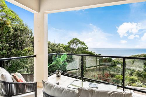 an ocean view from the balcony of a house at Papillon Coolum in Coolum Beach