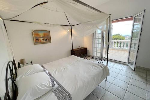 Katil atau katil-katil dalam bilik di Rose d'Antibes