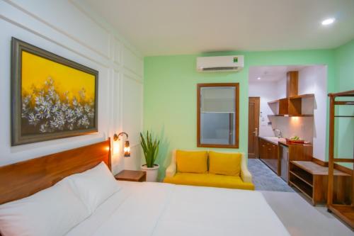 Mai Home - Apartment & Homestay tesisinde bir odada yatak veya yataklar