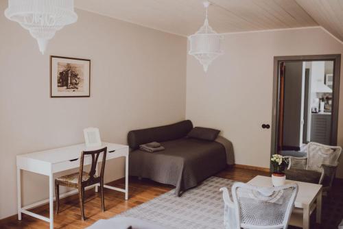Гостиная зона в Šaha Kluba Apartamenti