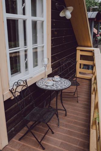 Балкон или терраса в Šaha Kluba Apartamenti