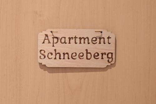 a sign on a wall that says equipment maintenance at Waldschlössl Schneedörfl in Reichenau