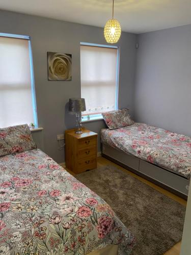 Ένα ή περισσότερα κρεβάτια σε δωμάτιο στο Bambz Apartment 3