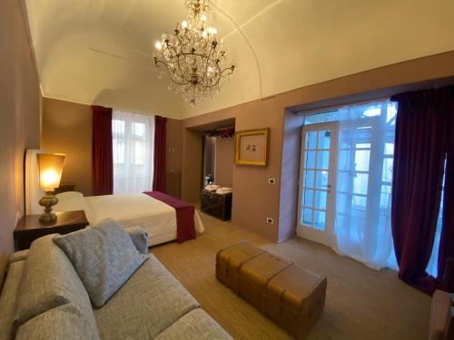 Postel nebo postele na pokoji v ubytování Suites Edivino Design Capri