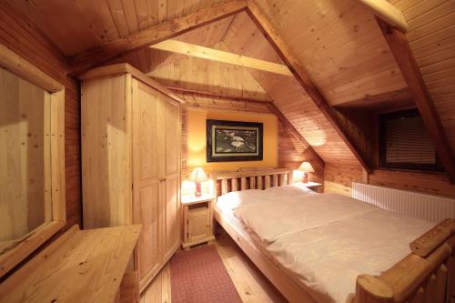 Ein Bett oder Betten in einem Zimmer der Unterkunft Art Apartments Minic