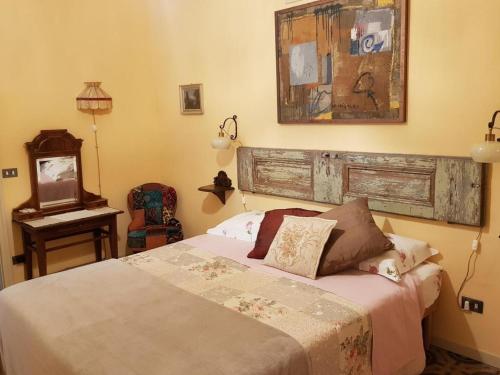Postel nebo postele na pokoji v ubytování Ca Balossa, Tremezzina lago di Como davanti a Bellagio e villa Balbianello
