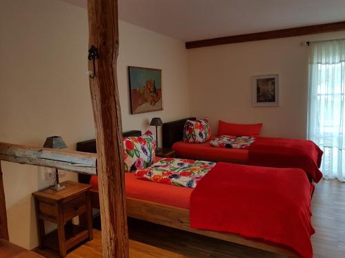 Ένα ή περισσότερα κρεβάτια σε δωμάτιο στο Landgut Apfelrose