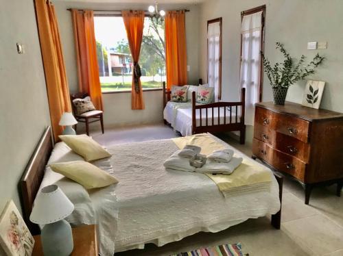 Ένα ή περισσότερα κρεβάτια σε δωμάτιο στο Las Brisas casas de campo un lugar para soñar