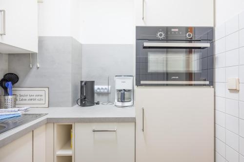 Kuchyň nebo kuchyňský kout v ubytování Lütte Bude