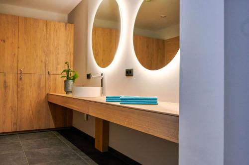 Fotografie z fotogalerie ubytování Wellness und Brunch Hotel MorgenZeit beheizter Naturpool mit Sandstrand Genuss Frühstück bis 13 Uhr Hochkönig Sommercard v destinaci Maria Alm am Steinernen Meer