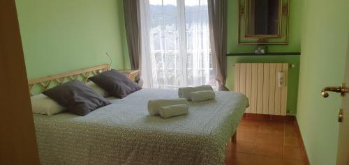 Säng eller sängar i ett rum på Villa Maria