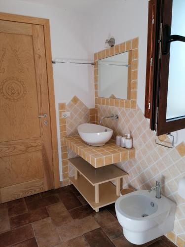 Ένα μπάνιο στο Casa La Liccia