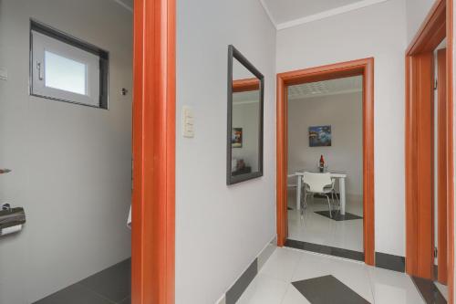 TV a/nebo společenská místnost v ubytování Apartmani Viki
