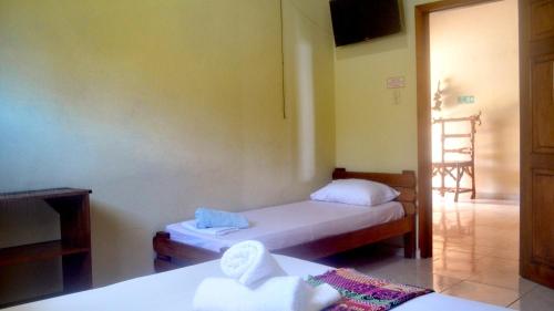 Hotel Costa Mar Coveñasにあるベッド