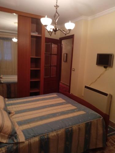 Ένα ή περισσότερα κρεβάτια σε δωμάτιο στο Casa Freitas