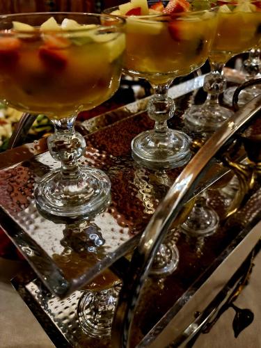 a group of three wine glasses sitting on a table at Riad Fes Nass Zmane in Fès