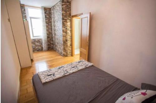 Cama o camas de una habitación en 3 bedrooms apartement with jacuzzi and wifi at A Coruna 3 km away from the beach