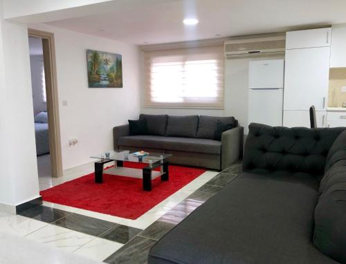Posezení v ubytování Seafront - 2 bedroom Modern