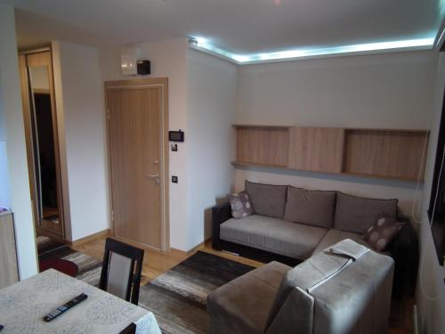 Ένα ή περισσότερα κρεβάτια σε δωμάτιο στο Apartman A7 u vili Pahulja