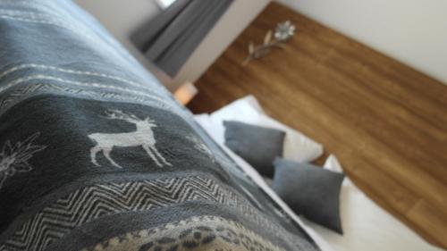 Postel nebo postele na pokoji v ubytování Leben!Pur - Alpenlofts