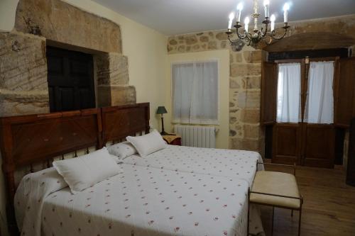 Ein Bett oder Betten in einem Zimmer der Unterkunft Apartahotel Montecaoru
