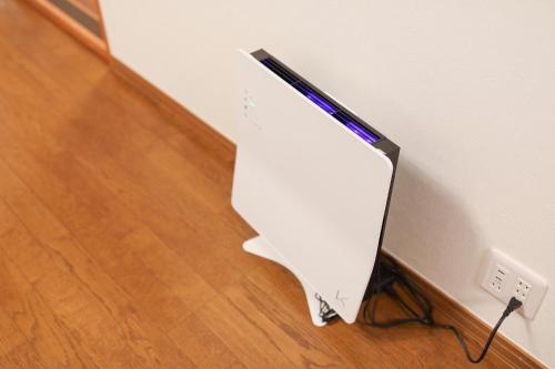 a white object is leaning against a wall at Mon Petit Chat in Kanazawa