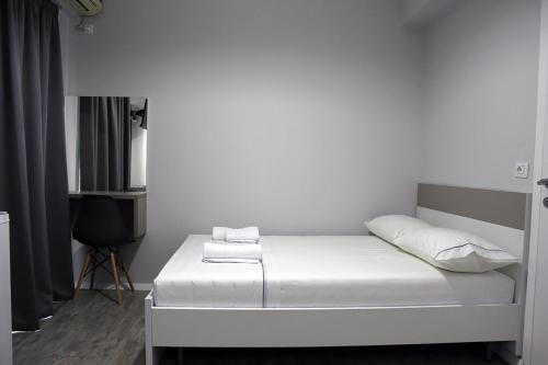 Postel nebo postele na pokoji v ubytování Hotel Cakalli