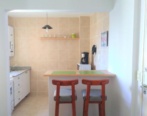 Una cocina o zona de cocina en Hermoso departamento con excelente ubicación