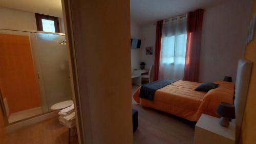 La Suite Di Segestaにあるベッド