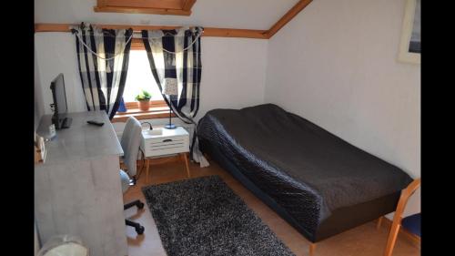 Cama o camas de una habitación en Ängens Gård