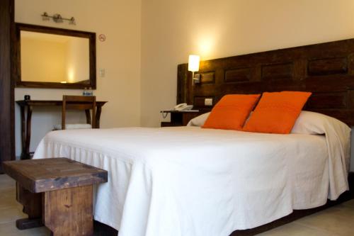 เตียงในห้องที่ Hotel Casa Selah