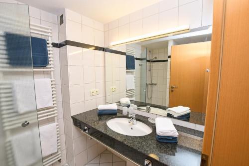 Ένα μπάνιο στο Appartement Rehn Büsum