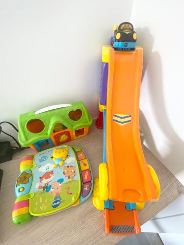 a toy set of two play sets on a table at Belle maison de 140m2, proche centre ville in Challans