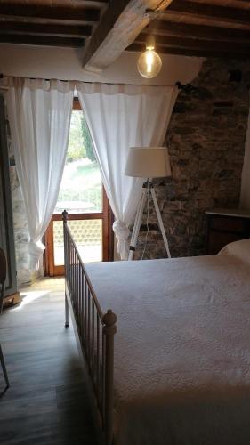 Postel nebo postele na pokoji v ubytování La pecora e l agnello