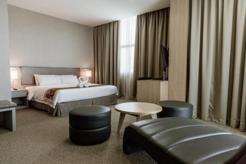 Postel nebo postele na pokoji v ubytování Hotel N°5