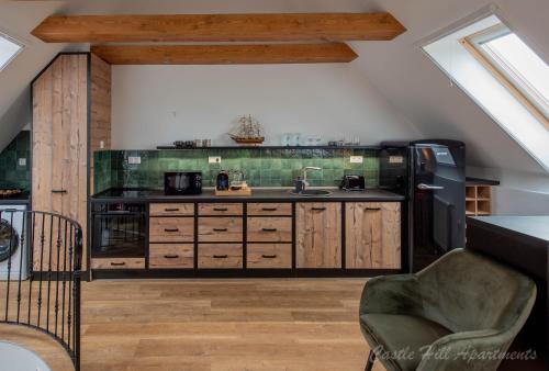 A kitchen or kitchenette at Eger Castle Hill Premium Apartments