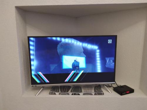 TV a/nebo společenská místnost v ubytování Apartman CENTAR