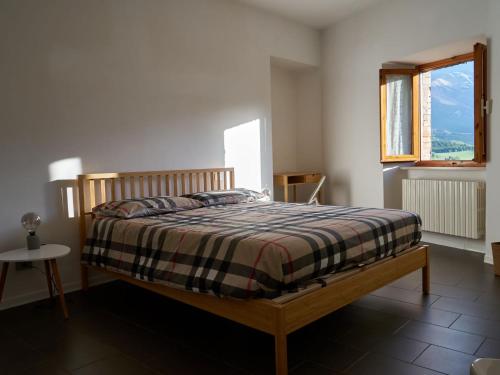 En eller flere senge i et værelse på La Casa di Giulia
