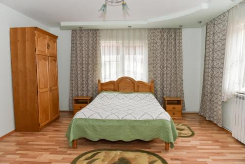 Casa Maria tesisinde bir odada yatak veya yataklar