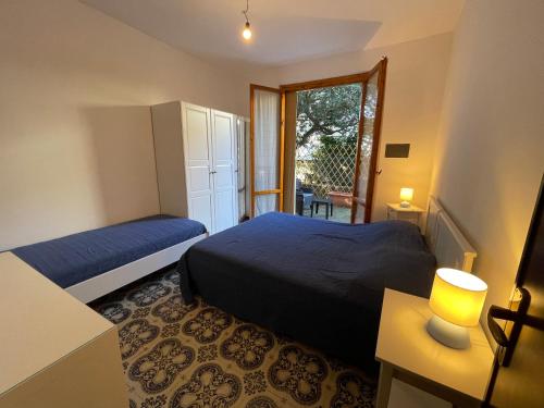 Postel nebo postele na pokoji v ubytování Appartamenti Pino Italico