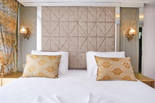 Postel nebo postele na pokoji v ubytování Sultan Suleyman Palace Hotel & Spa