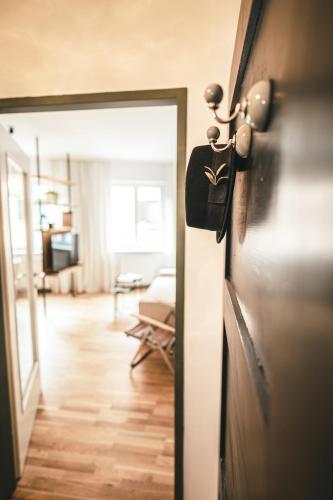 a door with a door knob and a living room at The Gallery in Bad Ischl