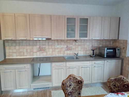 Η κουζίνα ή μικρή κουζίνα στο Apartmány Tonka 309