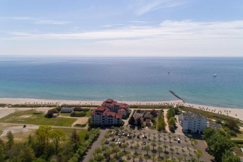 an aerial view of a resort and the beach at Turm-Appartement Strandburg in Fehmarn