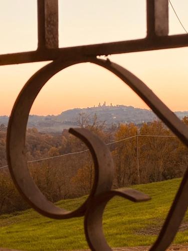 a view of a city from a window at Tognazzi Casa Vacanze - La Collina di San Gimignano in San Gimignano
