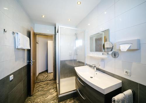 Koupelna v ubytování Central City Hotel
