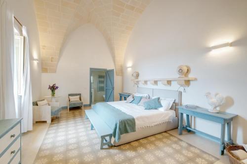Postel nebo postele na pokoji v ubytování Masseria Cuturi