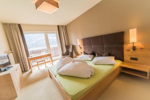 Ένα ή περισσότερα κρεβάτια σε δωμάτιο στο Residence Sardis